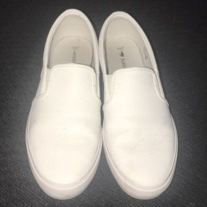 White leather Lacoste shoes